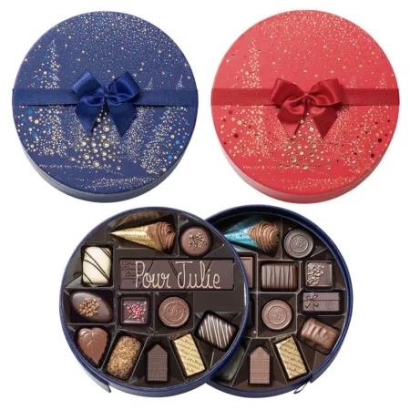 Boite de Noël ronde rouge ou bleue – 25 chocolats assortis et sa barre gourmande